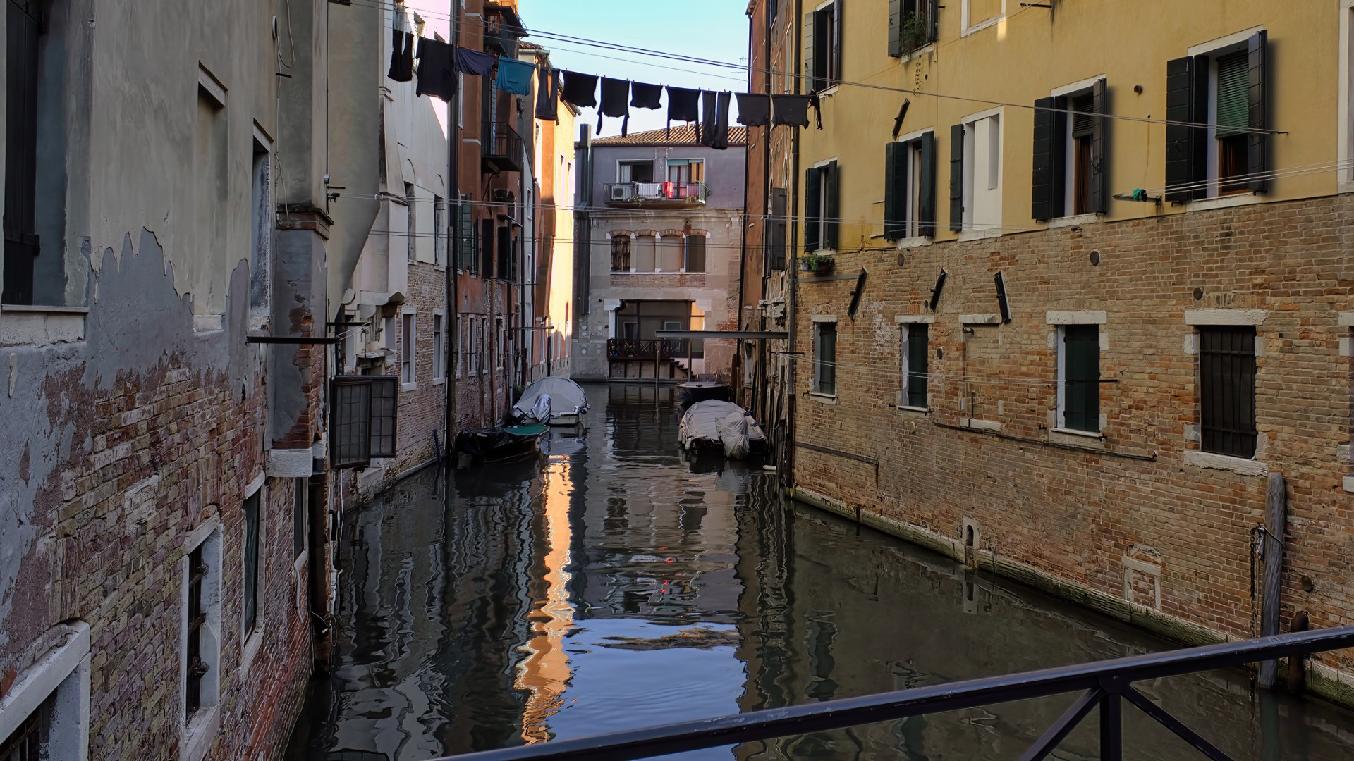 Venice's famed canals run dry as city grapples with climate change