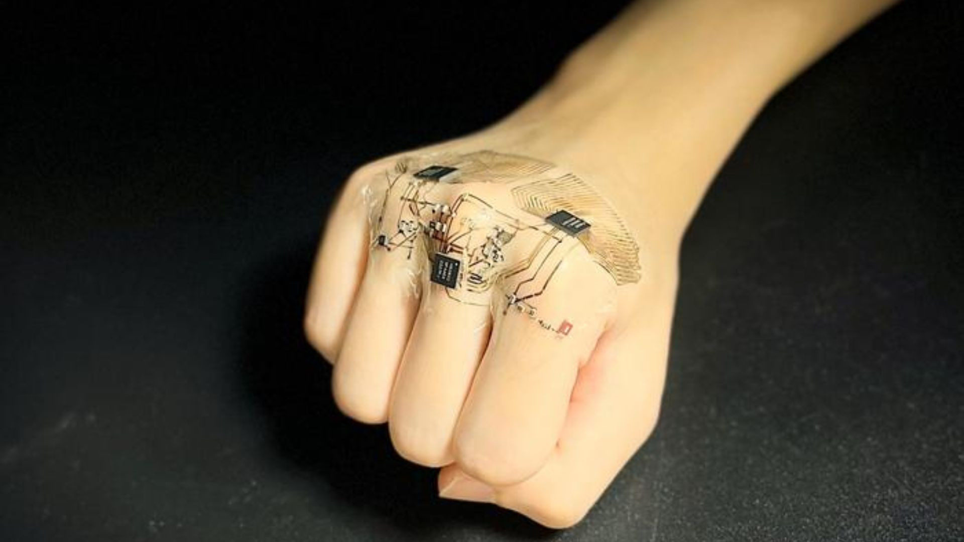 A close-up of a filigree ring, showcasing wires thinner than a human hair woven into an intricate floral pattern.