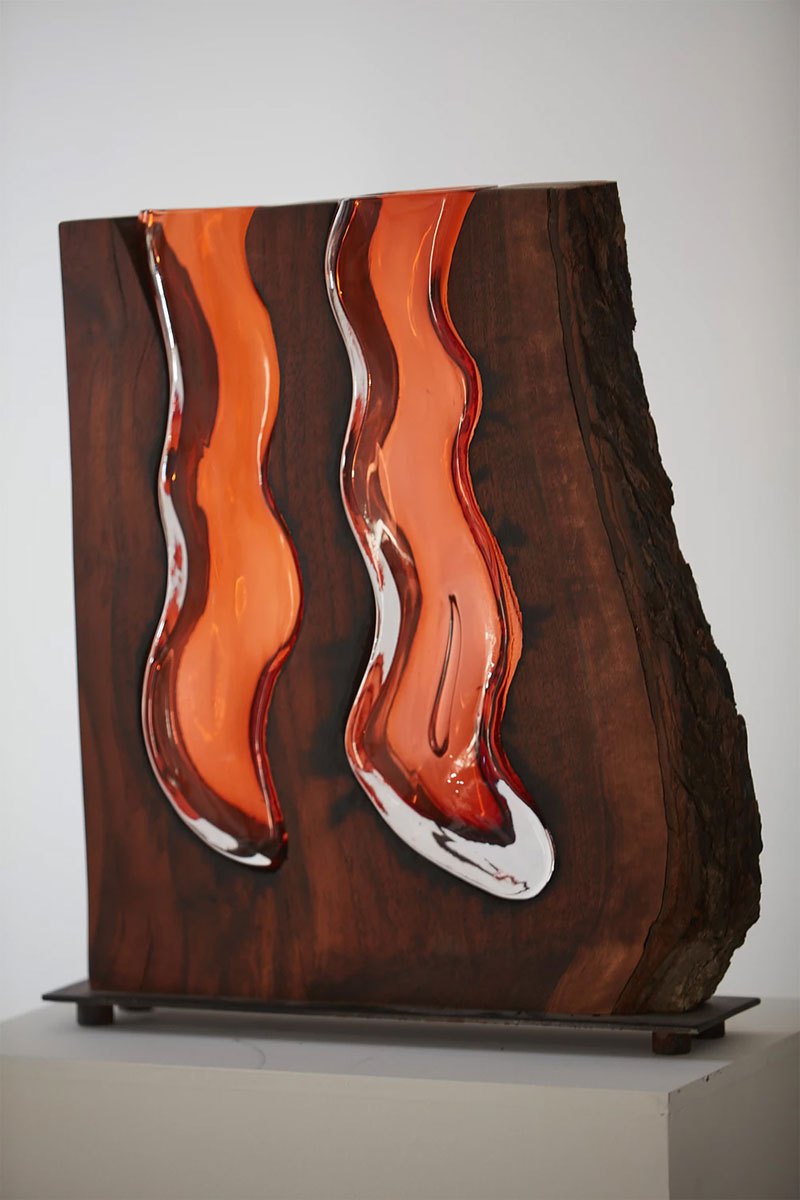 Glass Blower Achieves Stunning Results by Pouring Glass into Wood Slabs Glass Blower Achieves Stunning Results by Pouring Glass into Wood Slabs