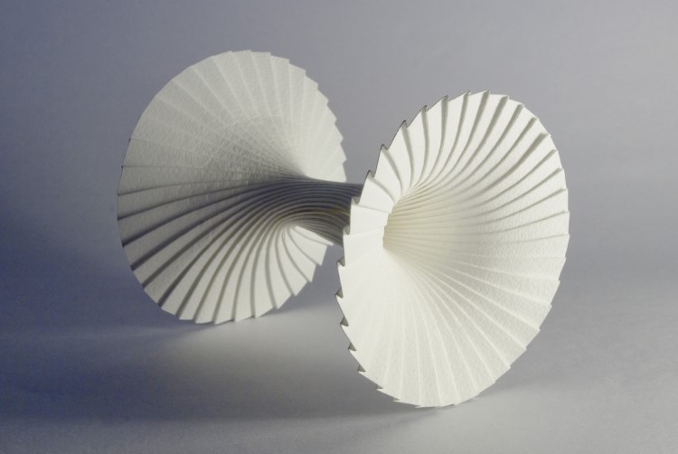 Modular paper sculptures intricately formed by artist