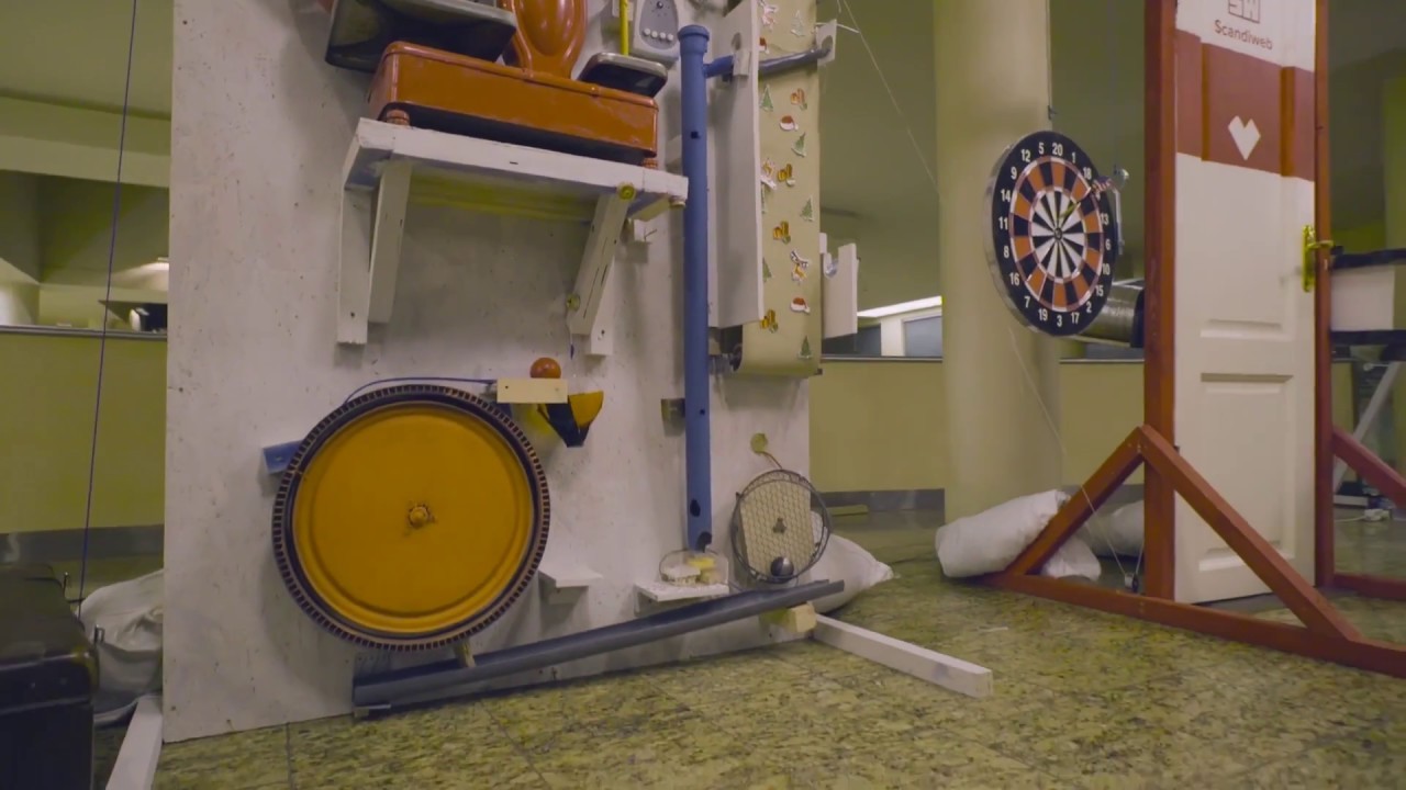 Watch the World's Largest Rube Goldberg Machine Light a Massive ...